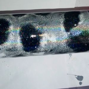 Tumbler handmade by Carrie glitter black and white cow print